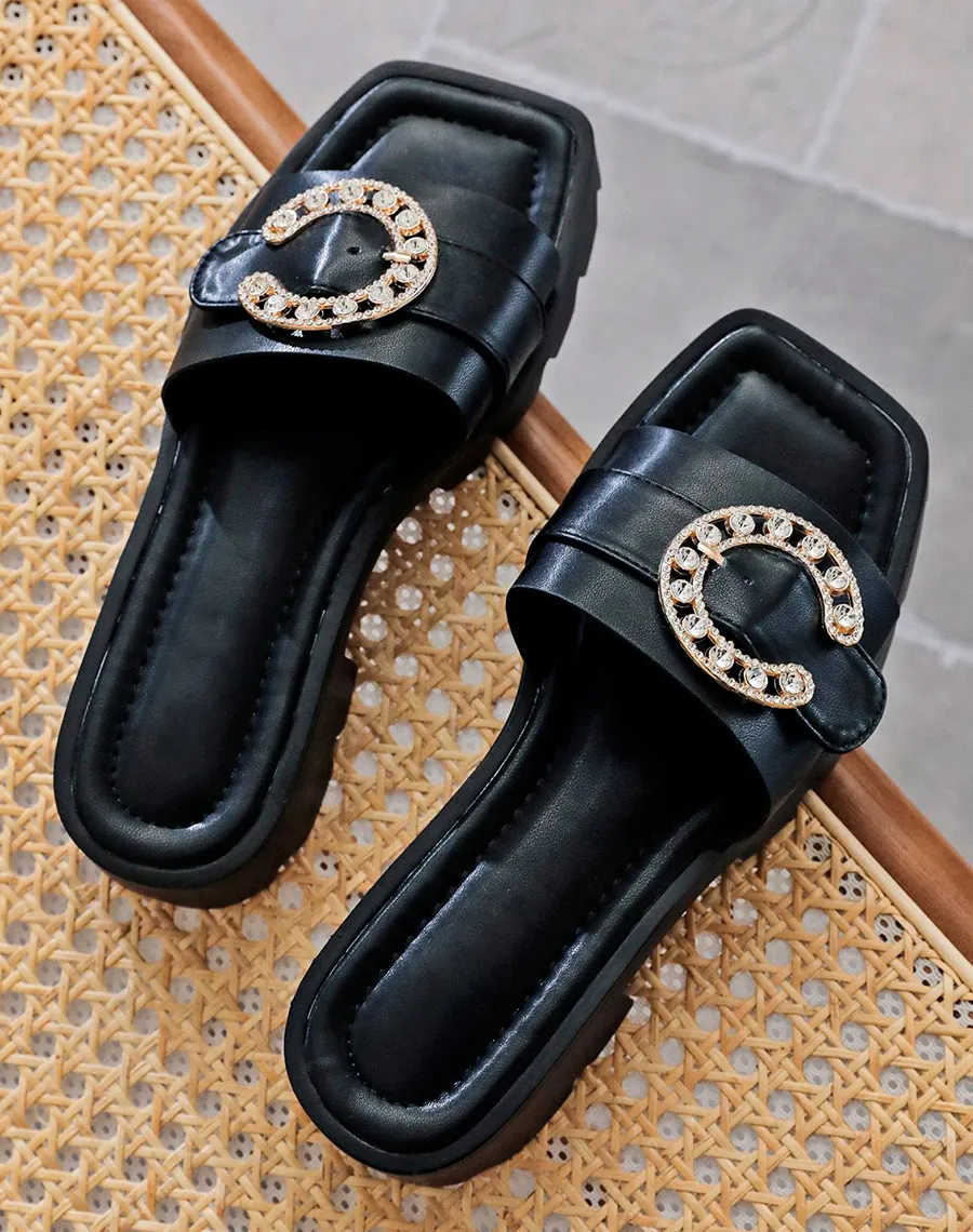 Mules noires à bijoux à strass et talon cranté